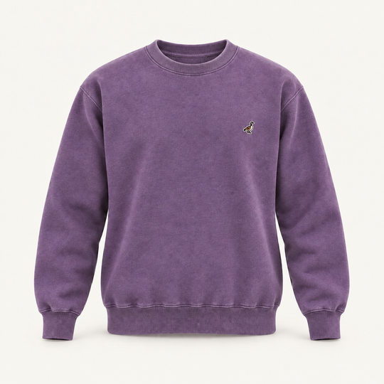 Washed purple Dominion City Heritage Goose crewneck with a small embroidered Canada goose on the left chest.
